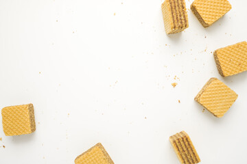 Cube wafer with chocolate cream on isolated white background