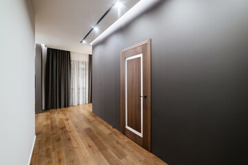 Interior design of the house with a black and white wall - obrazy, fototapety, plakaty