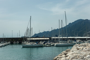 Fototapeta na wymiar Marina in the south of Salerno, Italy. Calm spring sunny day. Specially equipped harbor for yachts