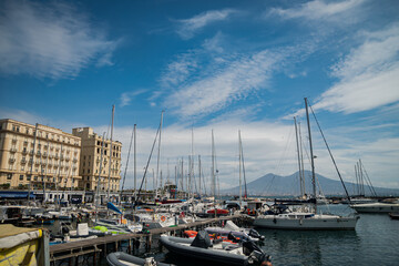 Fototapeta na wymiar Marina in the south of Naples, Italy. Calm spring sunny day. Specially equipped harbor for yachts