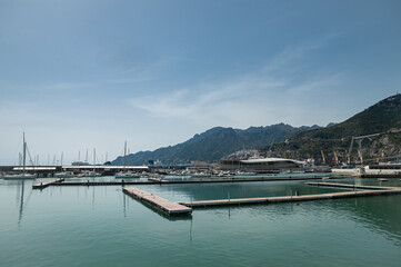 Fototapeta na wymiar Marina in the south of Salerno, Italy. Calm spring sunny day. Specially equipped harbor for yachts