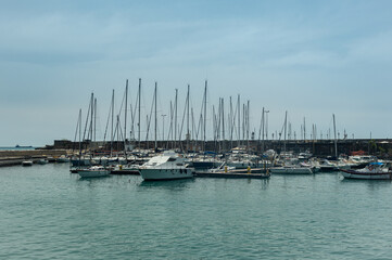 Fototapeta premium Marina in the south of Salerno, Italy. Calm spring sunny day. Specially equipped harbor for yachts