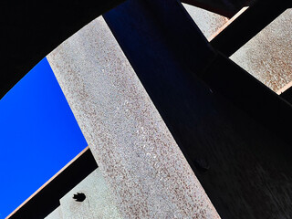 Metal beams and shadows