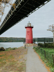 Red lighthouse on the shore