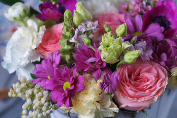 Decorative bouquet of many different small and large flowers