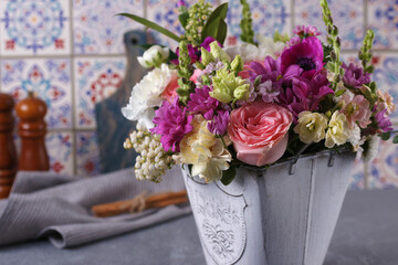 Decorative bouquet of many different small and large flowers