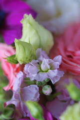Decorative bouquet of many different small and large flowers
