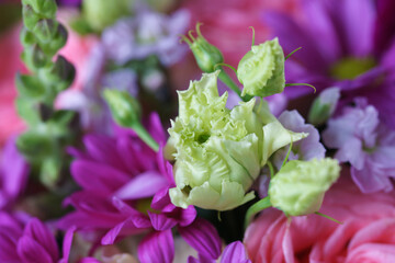 Decorative bouquet of many different small and large flowers