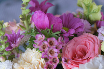 Decorative bouquet of many different small and large flowers