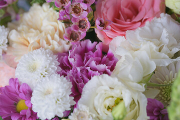 Decorative bouquet of many different small and large flowers