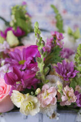Decorative bouquet of many different small and large flowers