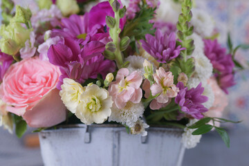 Decorative bouquet of many different small and large flowers