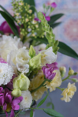 Decorative bouquet of many different small and large flowers