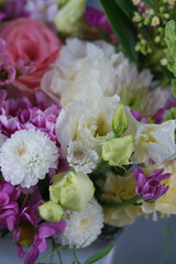 Decorative bouquet of many different small and large flowers