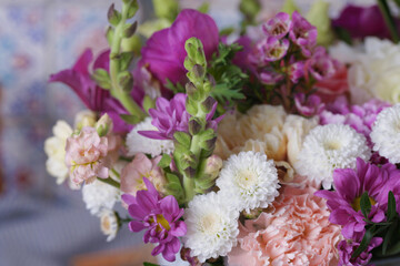 Decorative bouquet of many different small and large flowers
