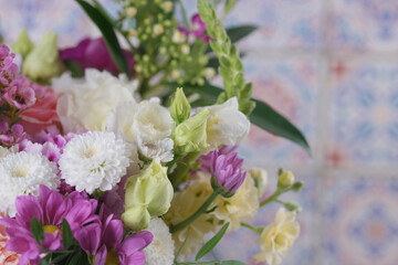 Decorative bouquet of many different small and large flowers