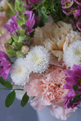 Decorative bouquet of many different small and large flowers