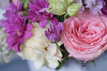 Decorative bouquet of many different small and large flowers
