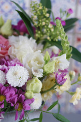 Decorative bouquet of many different small and large flowers