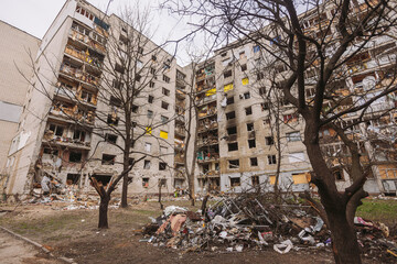 Damaged multi-storey house in ukrainian city Chernihiv near Kyiv on north of Ukraine. Ruins during...