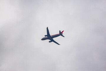 A civil airliner flies in the sky