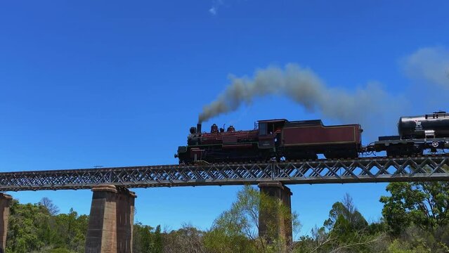 The Southern Downs Steam Railway (Warwick) Steam Train travelling over The Red Bridge Stanthorpe Queensland