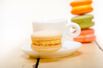 colorful macaroons with espresso coffee