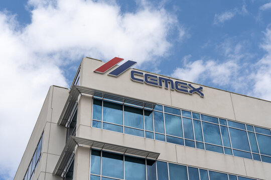 
Houston, Texas, USA - March 6, 2022: CEMEX&rsquo;s sign on its office building at its headquarters in Houston, Texas, USA. CEMEX is a global building materials company. 
