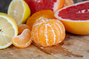 different types of citrus fruits together on the table