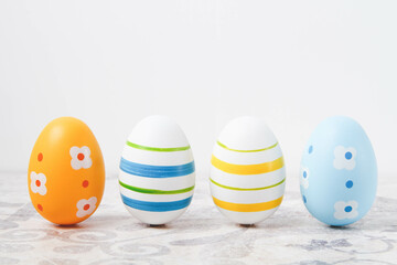 Easter. Multicolored eggs. Yellow and blue Easter decorations.