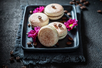 Delicious and fresh coffee macaroons as a brown dessert.