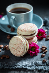 Homemade and sweet coffee macaroons as a brown dessert.