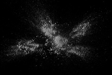 White powder isolated on black texture, top view with clipping path