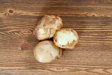 several fresh potatoes of the new young crop potatoes