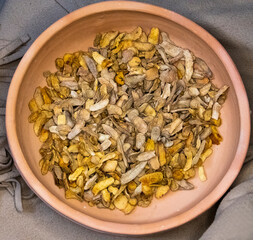 Dried Turmeric in brown pot