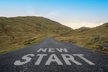 New Start written on a mountain pass road in the Lake District.