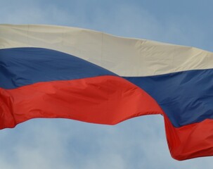 The flag of Russia curls in the wind
