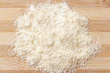 Fototapeta na wymiar organic raw almond flour over rustic wooden table