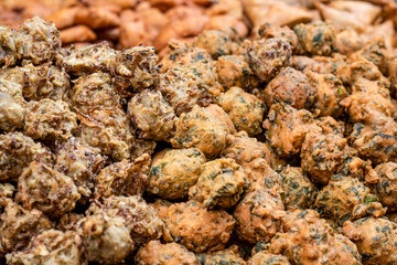 Rustic spicy indian street food close up with selective focus