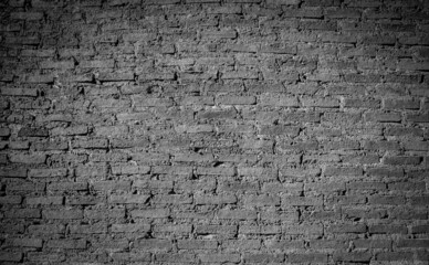 Red brick wall texture,an assortment of old red bricks in construction, brown and red brick grunge background, red brick wall panoramic with black backgorund.
for interior design