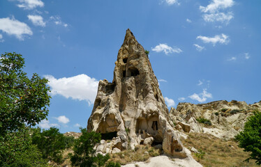 The cave house, rock formations in Cappadocia, Turkey. Landscape view of Capadocia 