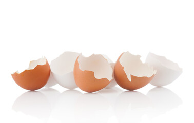 Cracked egg shells  close up on white background