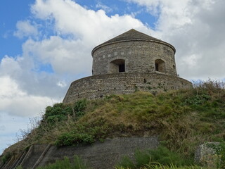 old fortress tower on the beach in Normandy, France