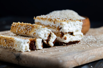 creamy cream and caramel cakes sprinkled with sesame