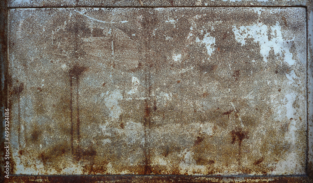 Wall mural rusty and weathered gray metal plate with worn white paint splatters and dirt grooves - background t