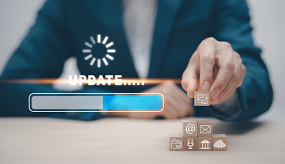 Businessman hand touch wooden block cube Update Software concept, Upgrade Business and Technology...