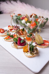 Set of assorted bruschetta. Variety of small sandwiches.