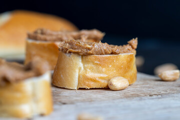 nut food on a cutting wooden board in the kitchen