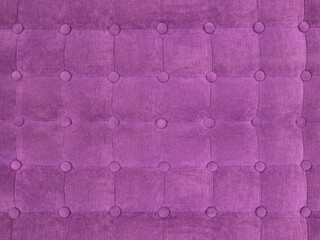 upholstery of velour buttoned purple violet color fabric, wall pattern. Elegant vintage quilted...