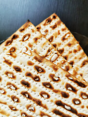 Matzah on a plate on a dark background